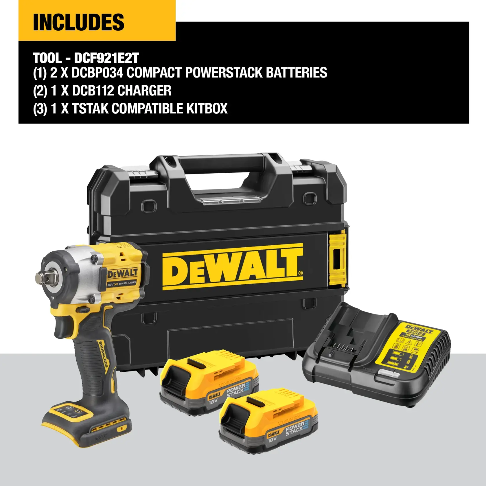 A DEWALT DCF921E2T tool kit including a cordless impact wrench, two compact Powerstack batteries, a DCB112 charger, and a black TSTAK compatible kitbox with yellow accents. The charger and batteries are visible in front of the kitbox.