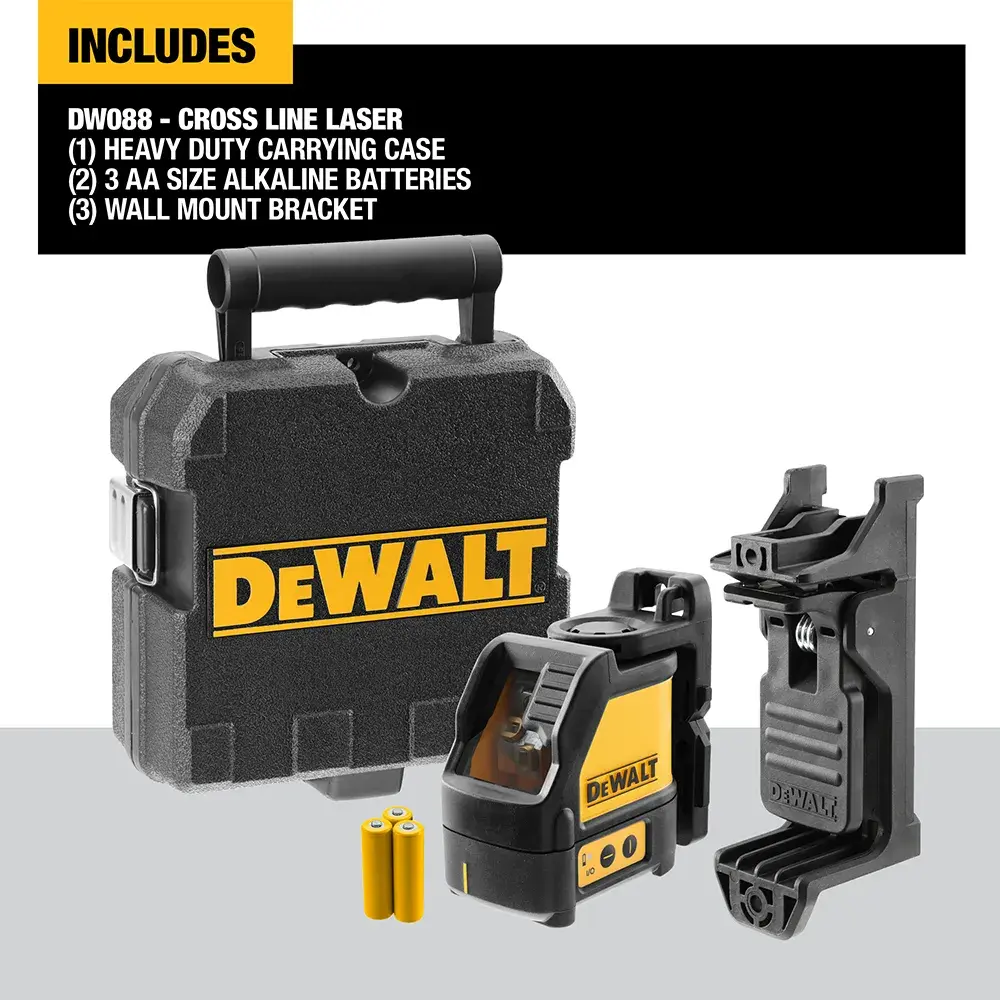 DEWALT green beam laser level DW088CG placed on a concrete floor inside a construction site.