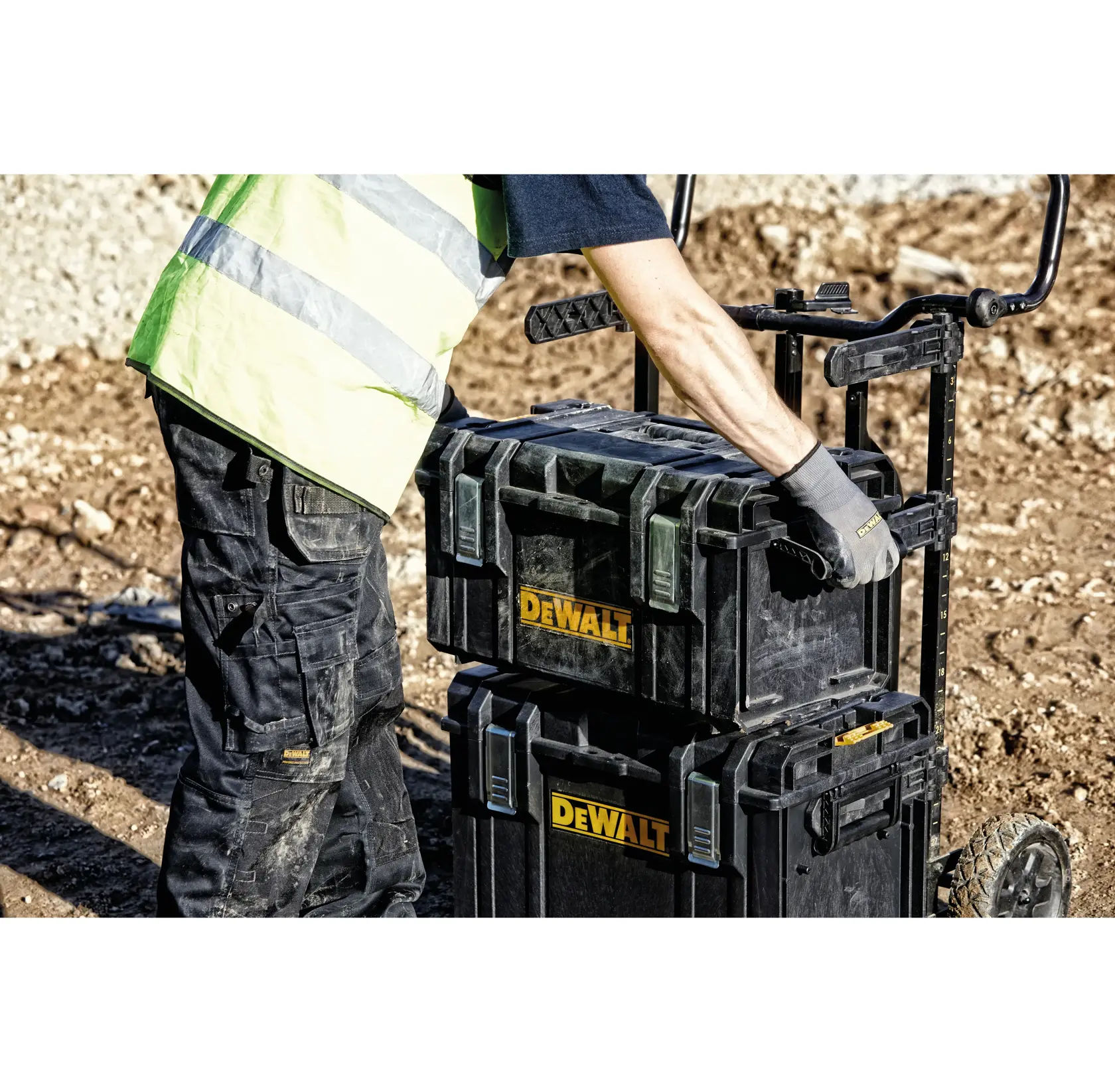 DEWALT ToughSystem 2.0 promotional graphic with the slogan 'Storage Built to Handle It' in large, bold yellow lettering on a dark, textured background.