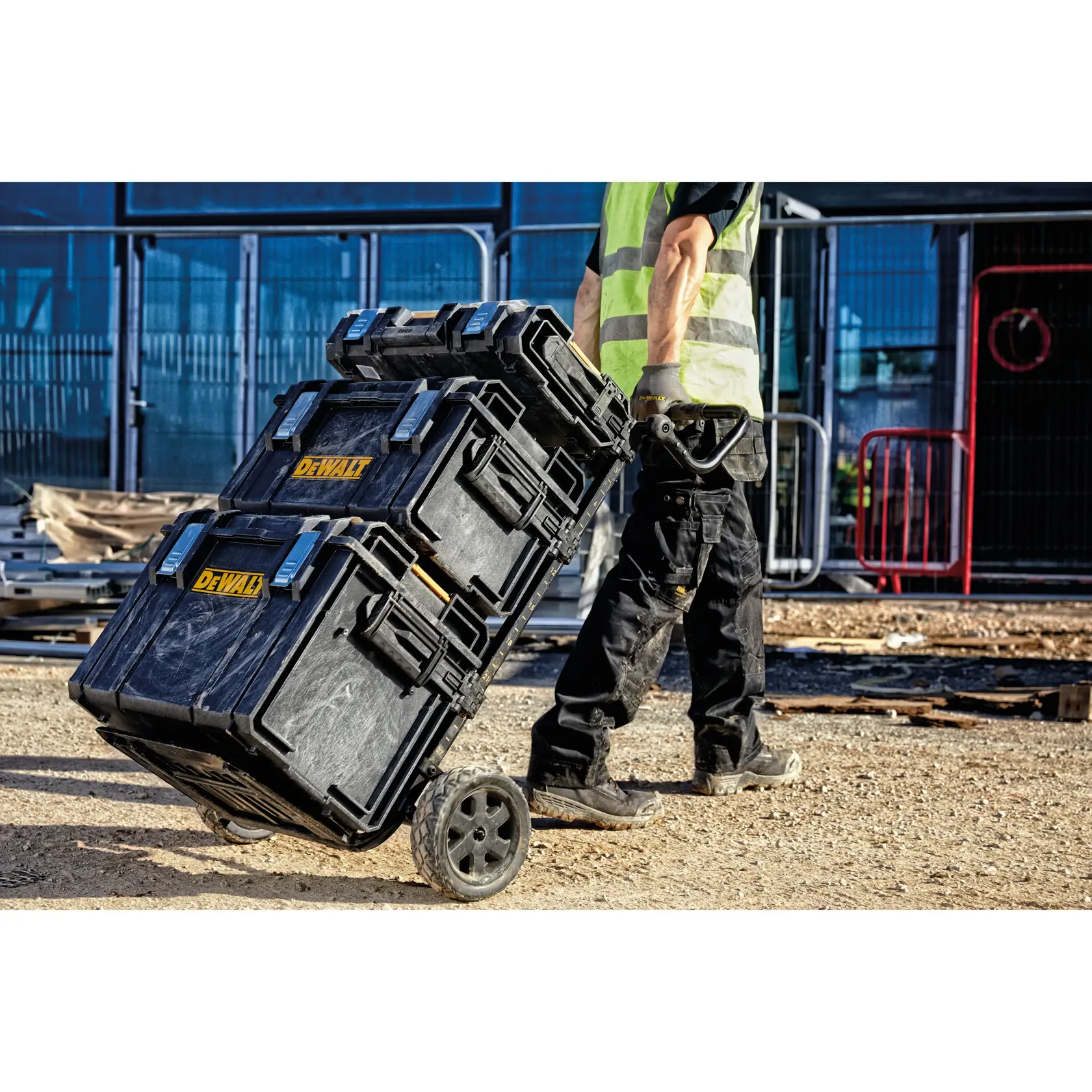 DEWALT ToughSystem 2.0 promotional graphic with the slogan 'Storage Built to Handle It' in large, bold yellow lettering on a dark, textured background.