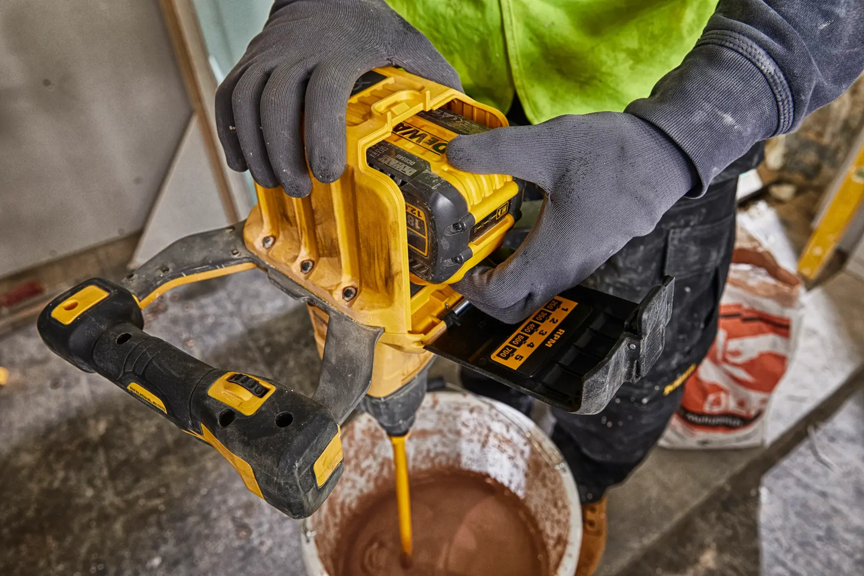 DEWALT FLEXVOLT logo with DEWALT in bold yellow letters and FLEXVOLT in white and red letters on a black background.