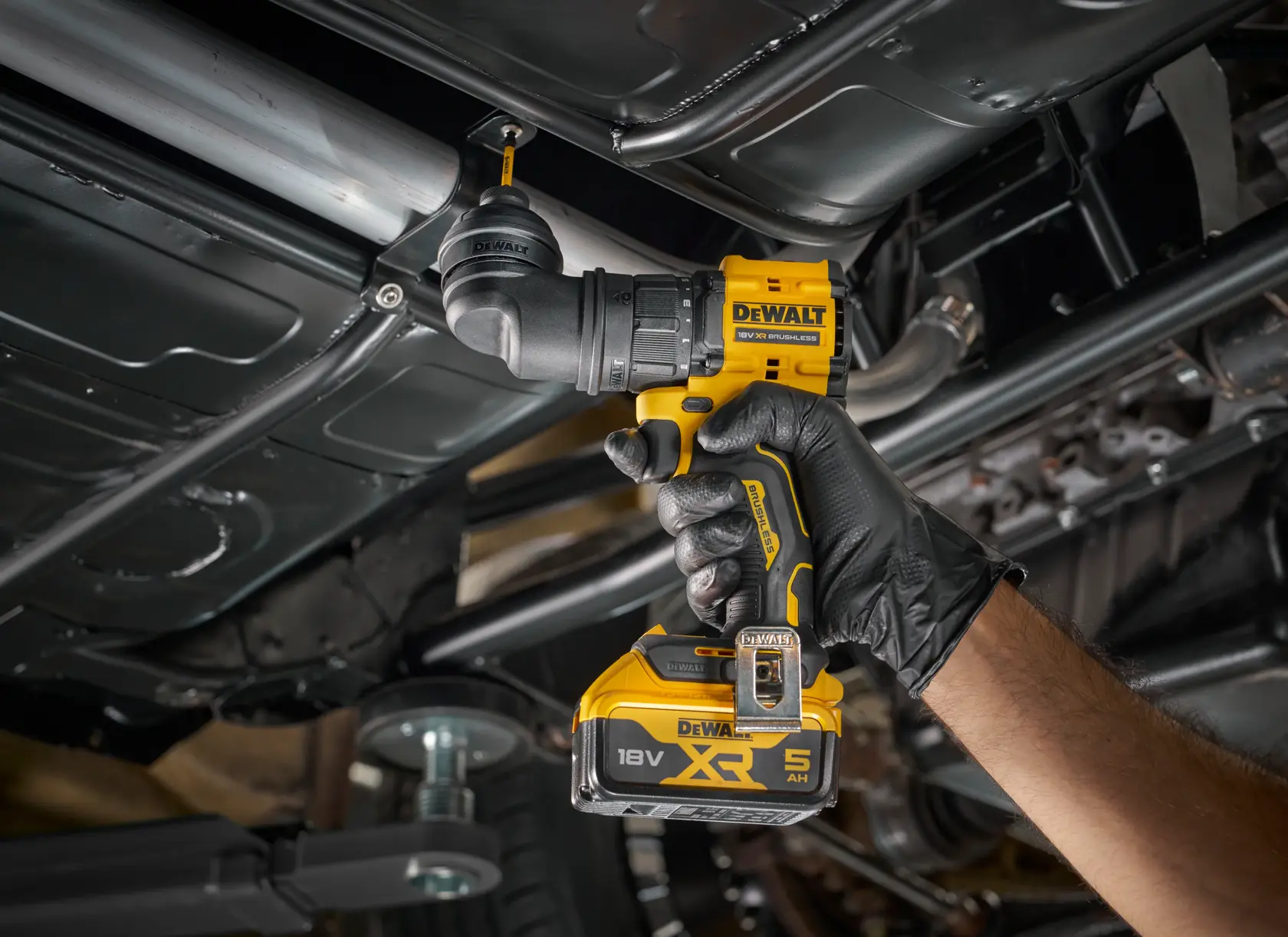 DEWALT drill DCD803P2T-QW and DCD803P2T used for automotive work in photography setting, shown held upright.