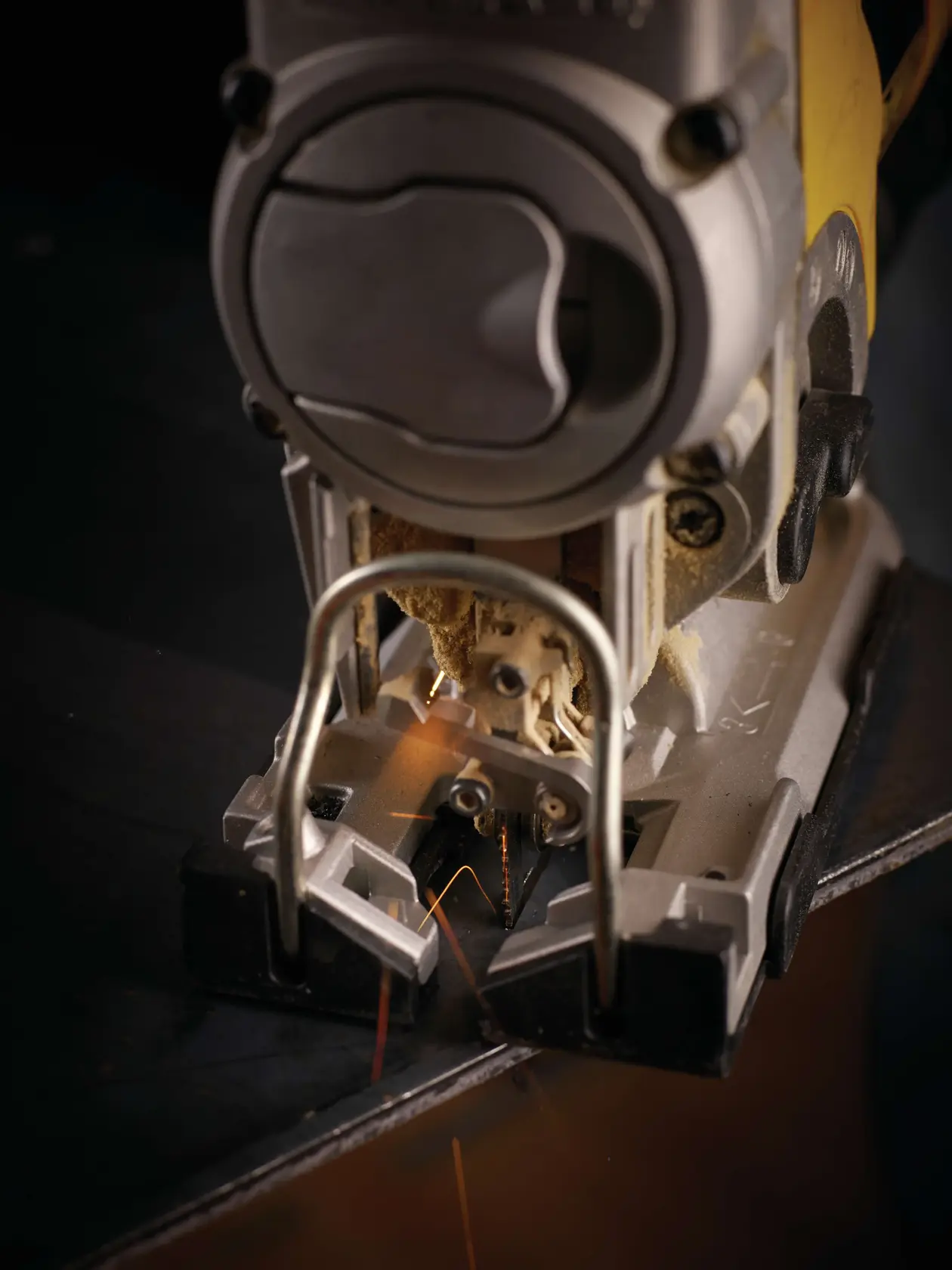 Photo of DeWalt jigsaw cutting metal, sparks visible. SKUs: DT2161, DT2161-QZ. Power tool close-up.
