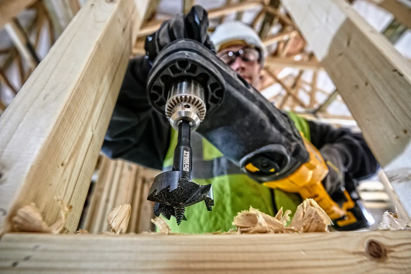 Graphic showing DEWALT XTREME Sub-Compact Series branding with the slogan 'Compact and Performance Packed' on a yellow background.