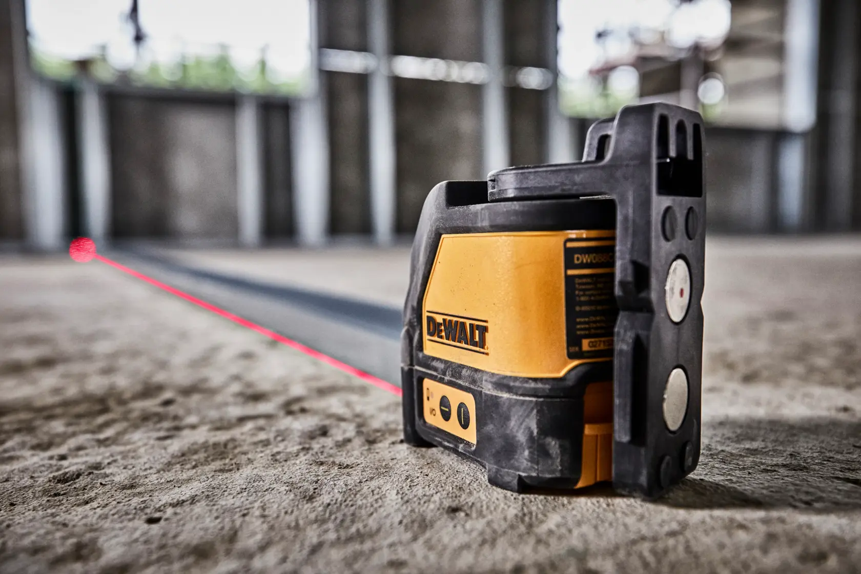 DEWALT DW088K yellow and black self-leveling line laser for photography and construction use.