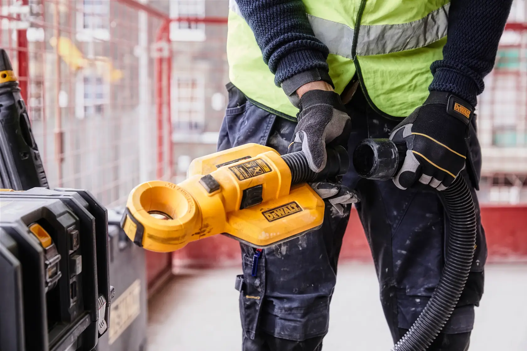DEWALT dust extraction tool for photography, SKUs DWH050, DWH050K, DWH050-XJ, shown in use on-site.