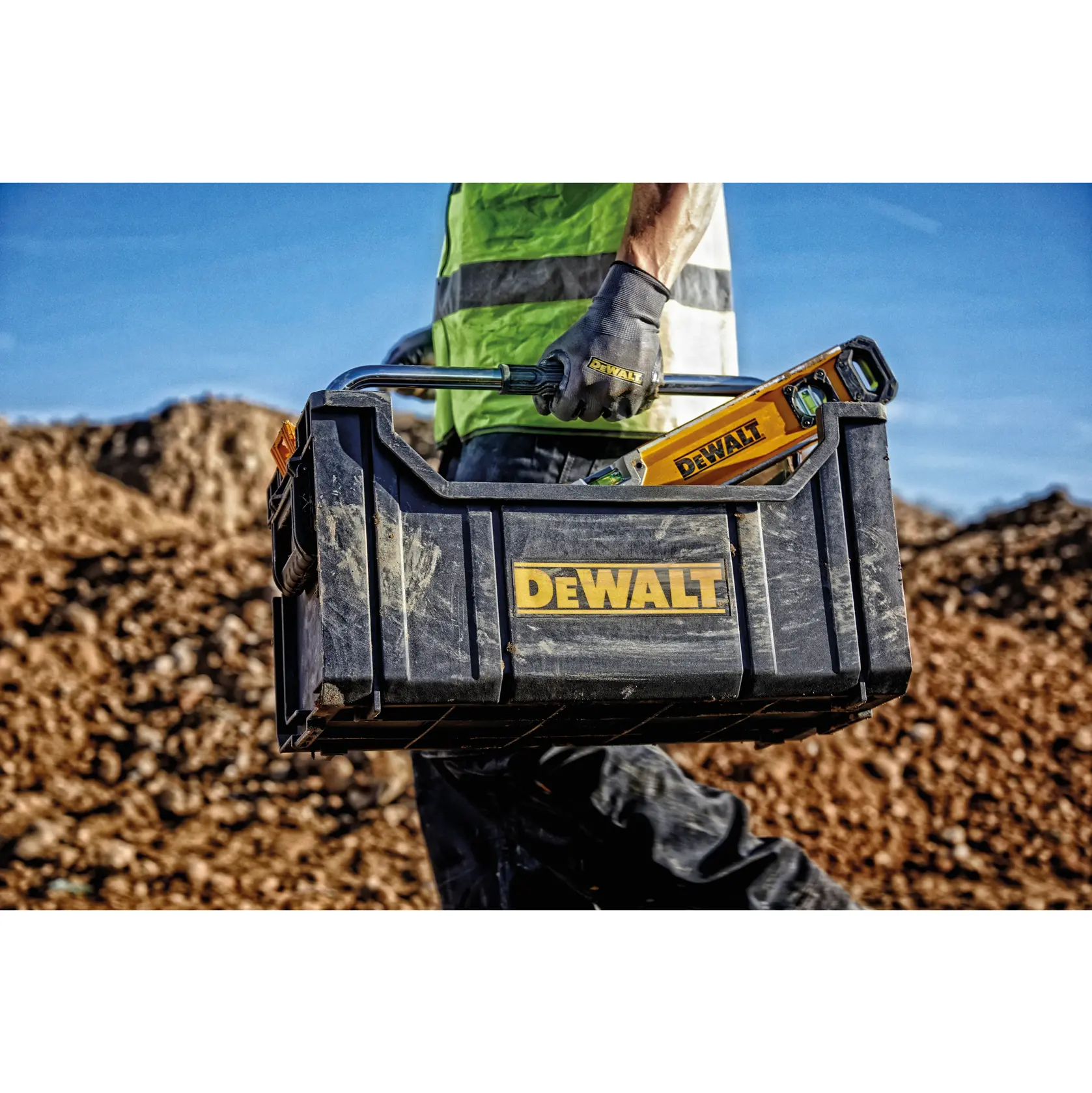 DEWALT ToughSystem 2.0 promotional graphic with the slogan 'Storage Built to Handle It' in large, bold yellow lettering on a dark, textured background.